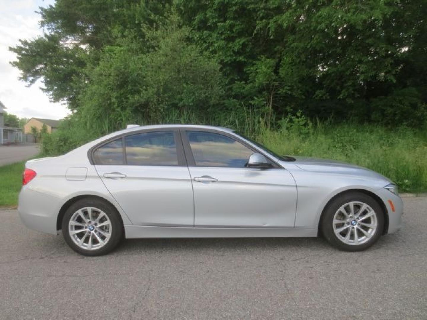 2016 Blue /Black BMW 3-Series (WBA8E5G59GN) with an 2.0l 4cyl Turbo engine, Automatic transmission, located at 270 US Route 6, Mahopac, NY, 10541, (845) 621-0895, 41.349022, -73.755280 - Photo#10